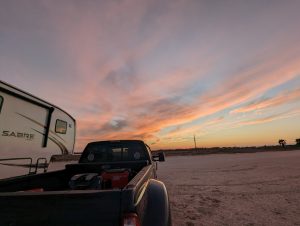 Truck and RV, sunset, Magnolia Beach, TX